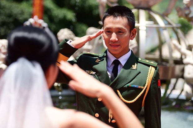  ‘ทหารหนุ่มชาวจีน’จัดงานวิวาห์หมู่ กว่า 88 คู่ เพื่อเหตุผลนี้